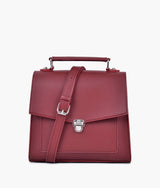 Maroon push-lock messenger bag